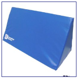 Bed positioning wedge